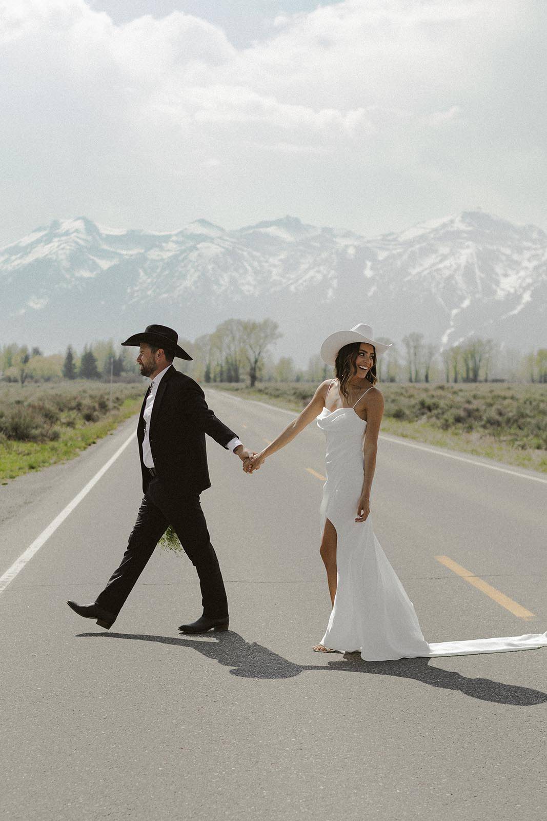 Bride and groom, walking in Jackson Hole