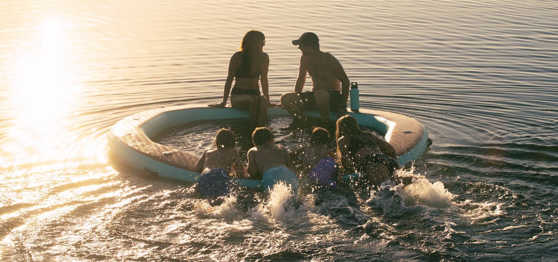 Enjoying Water Hammock pushed by kids