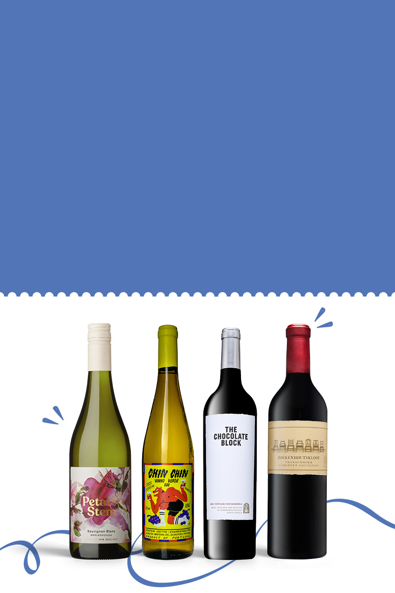 Four bottles of wine with a blue background.