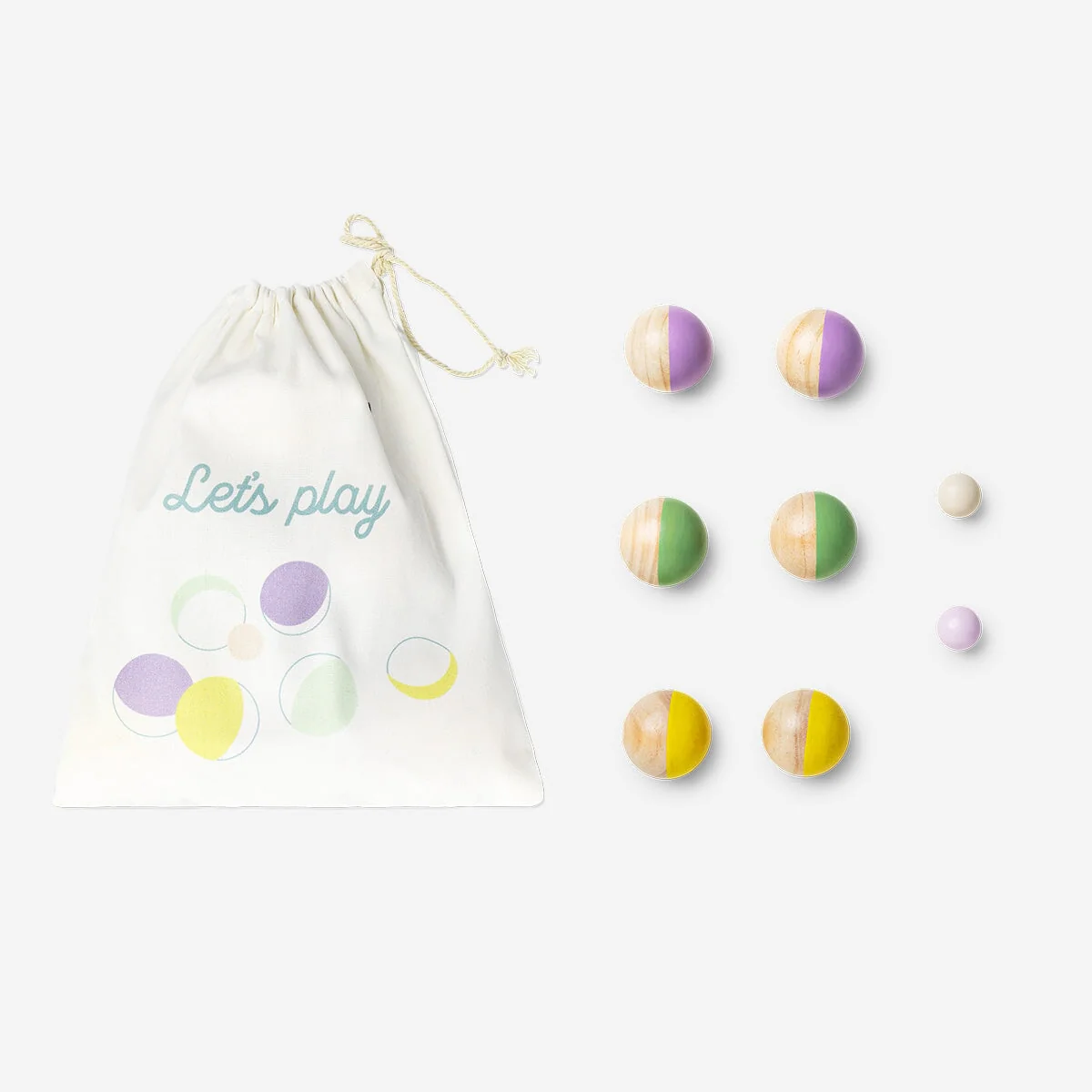 Colorful wooden petanque balls in a white drawstring bag with 'Let's Play' text, set on a light background.