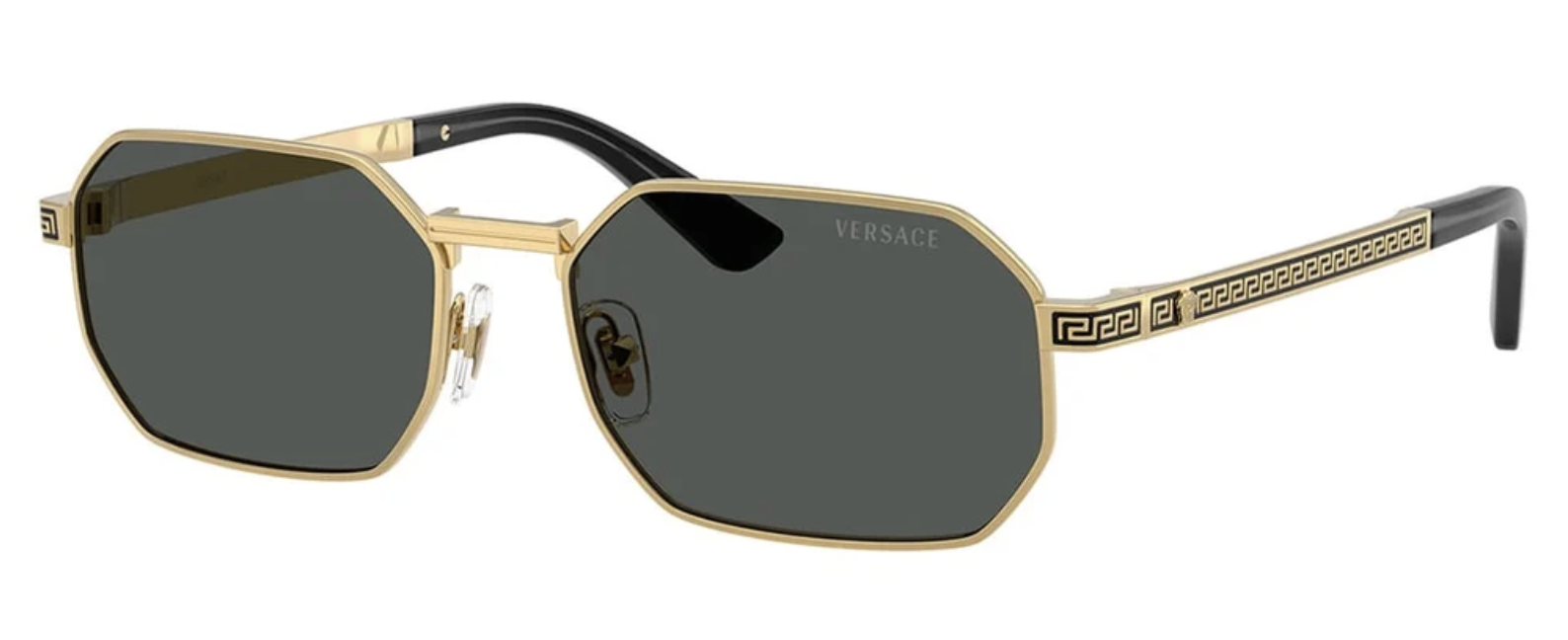 Stylish octagonal sunglasses with a gold frame and dark lenses.
