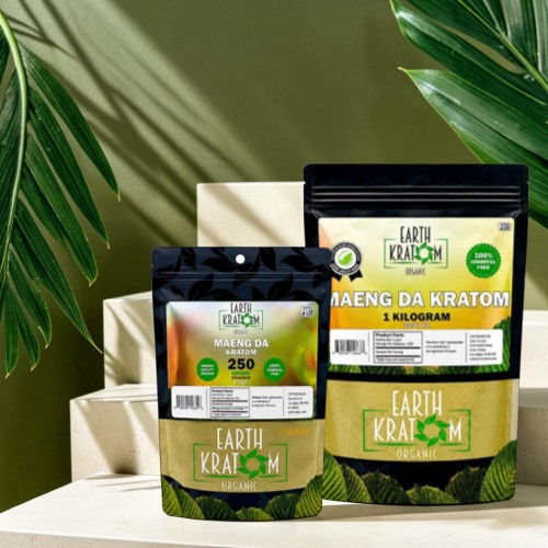 Bags of kratom products displayed with green leaves in the background.
