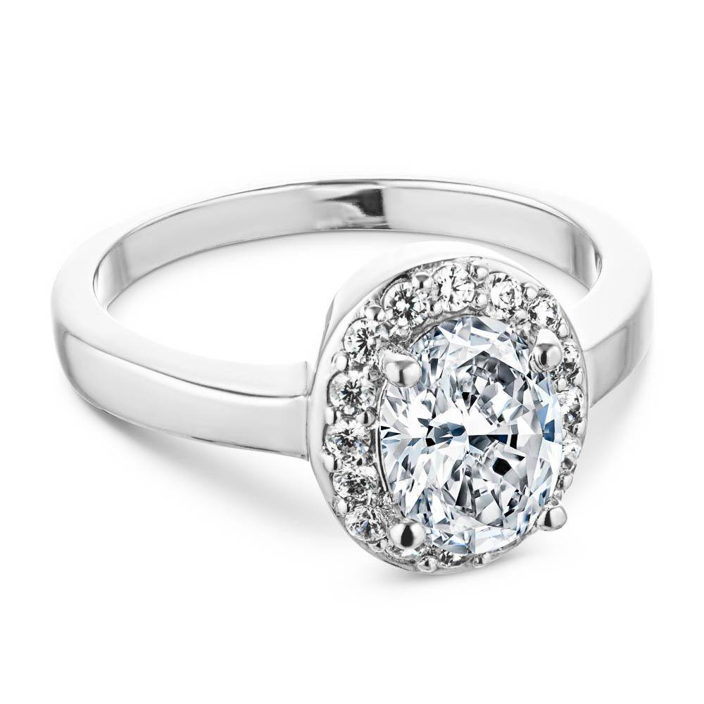 Engagement Ring shown with a 0.83ct oval cut Lab-Grown Diamond in a pavé set recycled diamond halo with recycled platinum