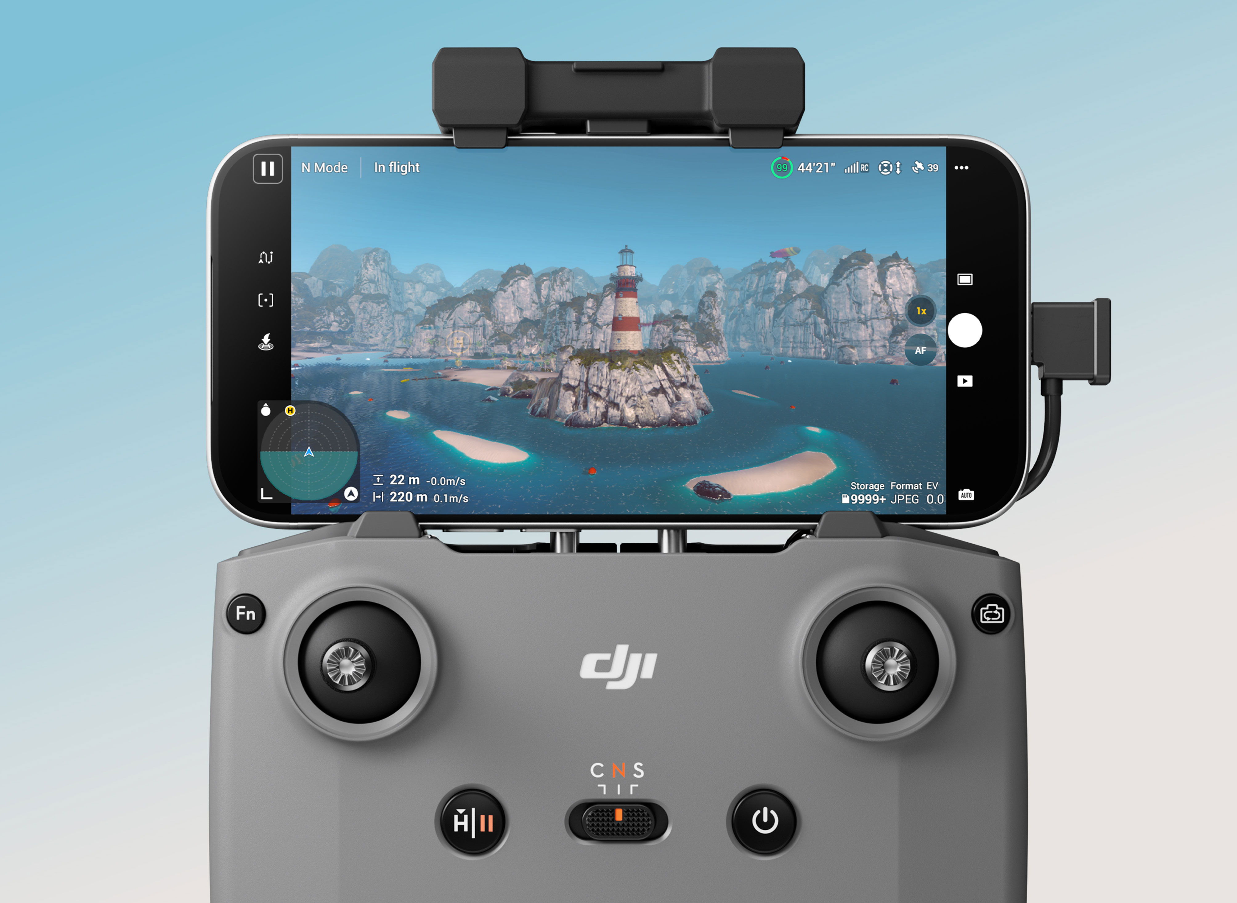 A DJI RC-N3 drone controller with a smartphone displaying a computer generated scenic landscape.