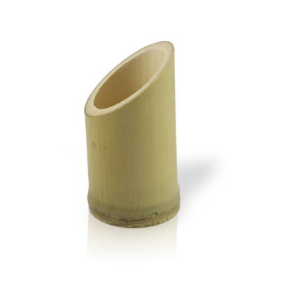 A natural looking bamboo cup with a slanted lip