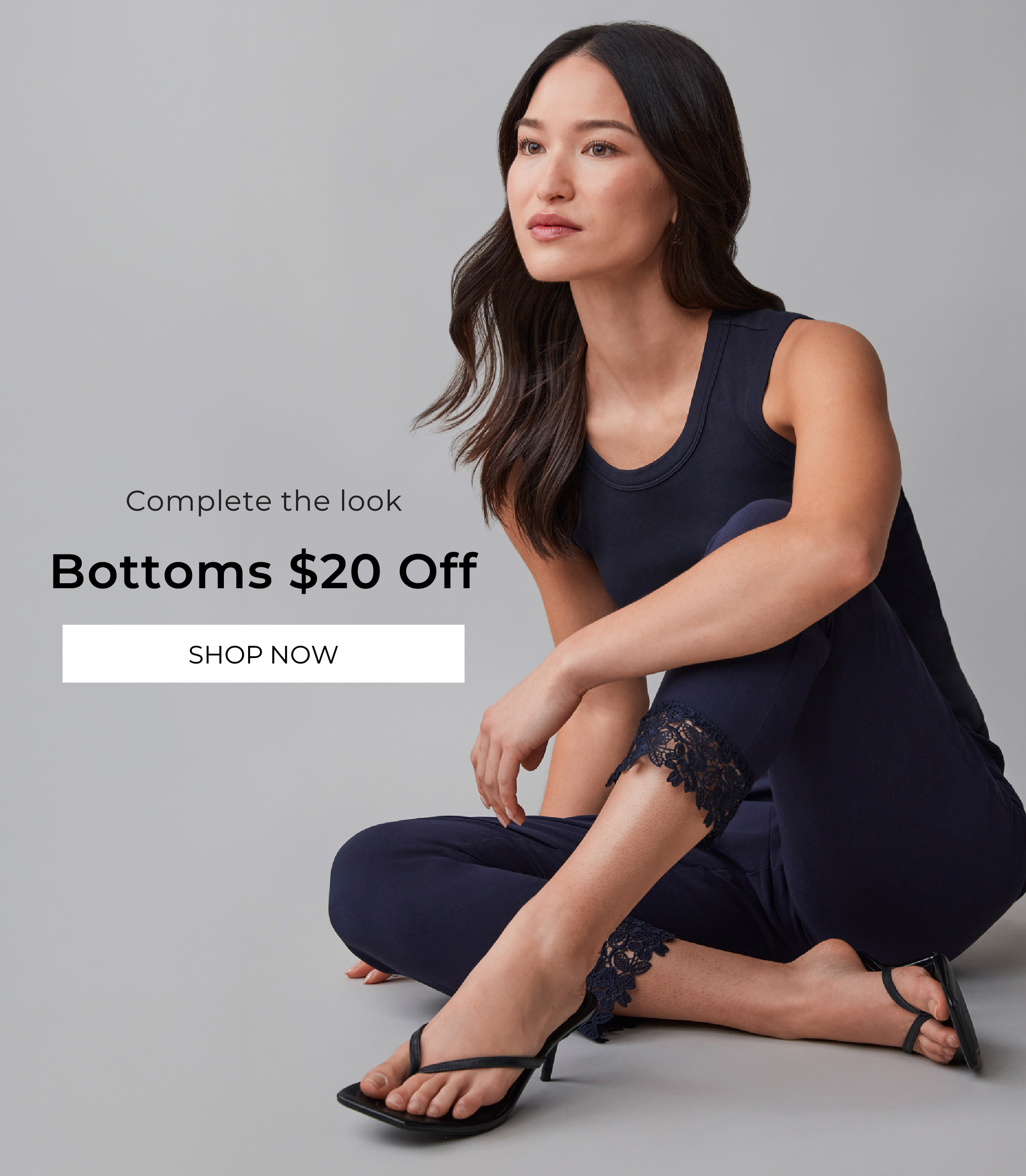 Woman in casual outfit promoting bottoms $20 off.