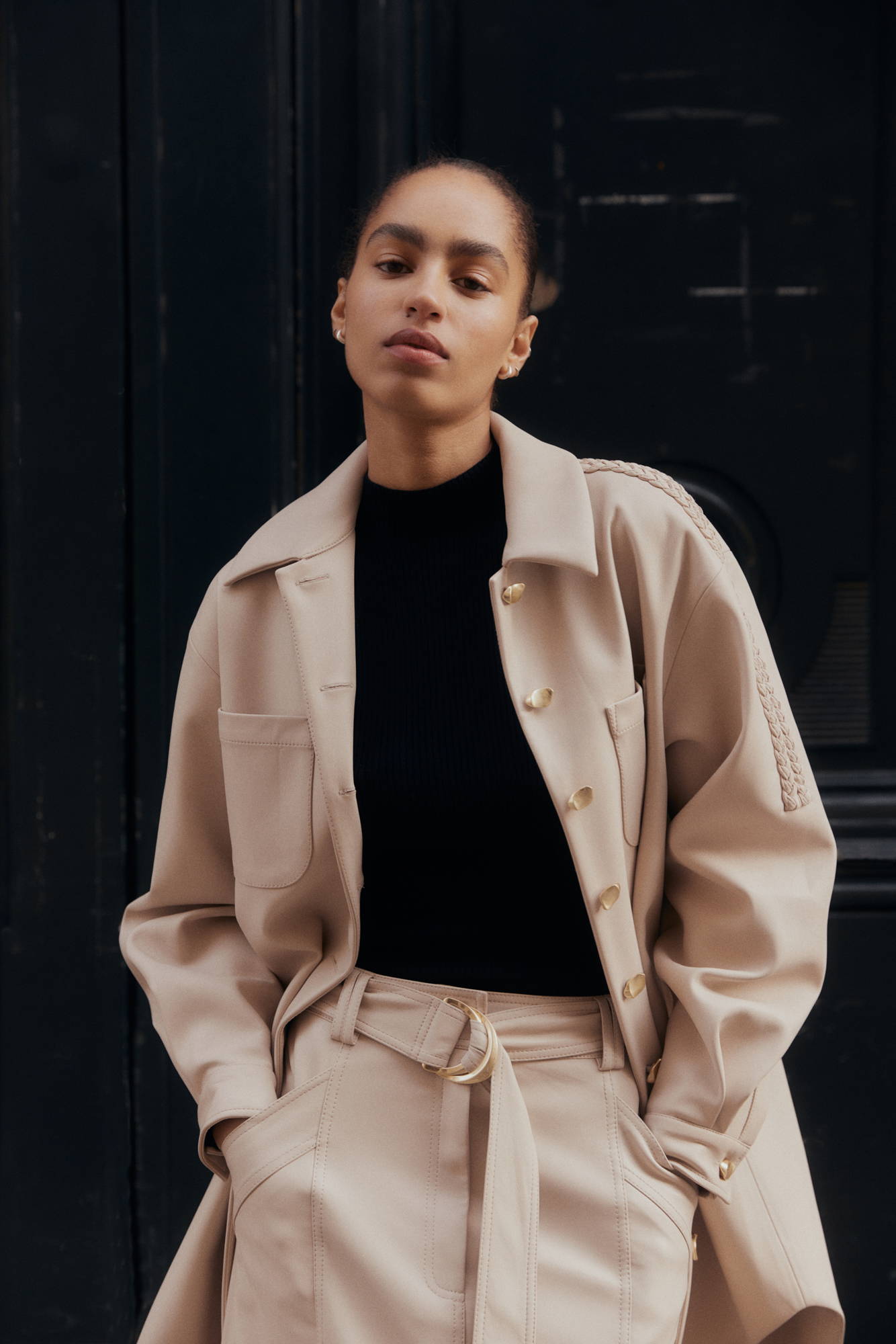 Modest fashion influencer Ana Octarina wears the Altitude Trench Coat from Aje's Eid Edit on the streets of Sydney