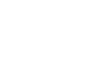 Icon of a person at a desk in a good posture working on a computer.