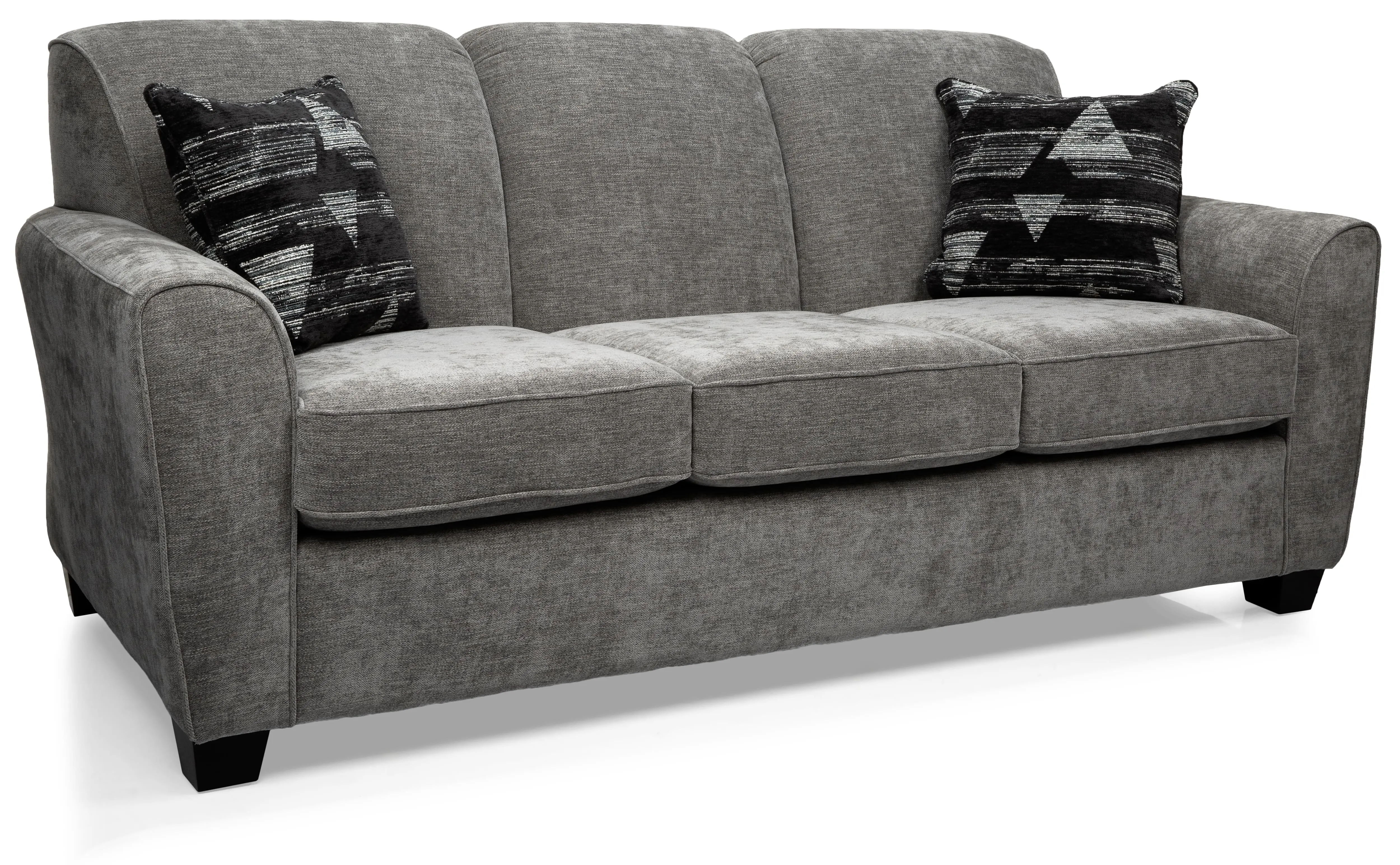 Gray couch with two decorative pillows in a modern design.