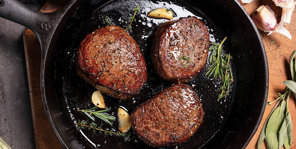 Skillet with 3 steaks