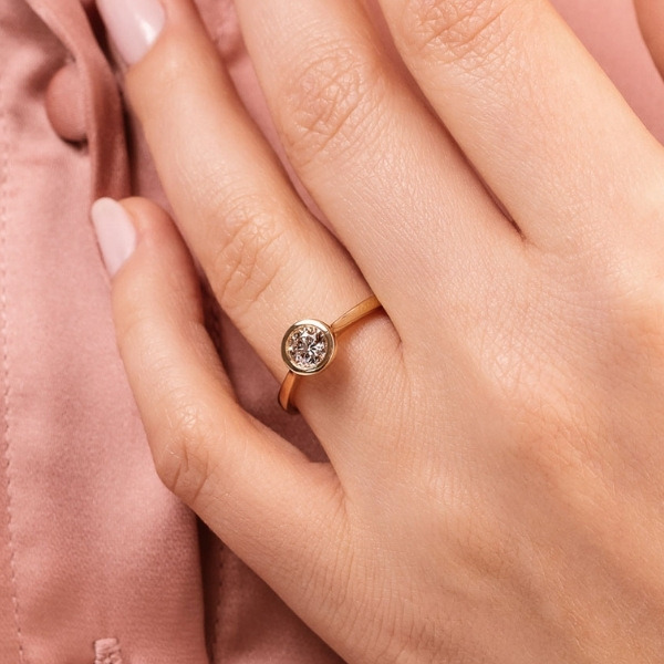 a beautiful bezel diamond gold wedding ring