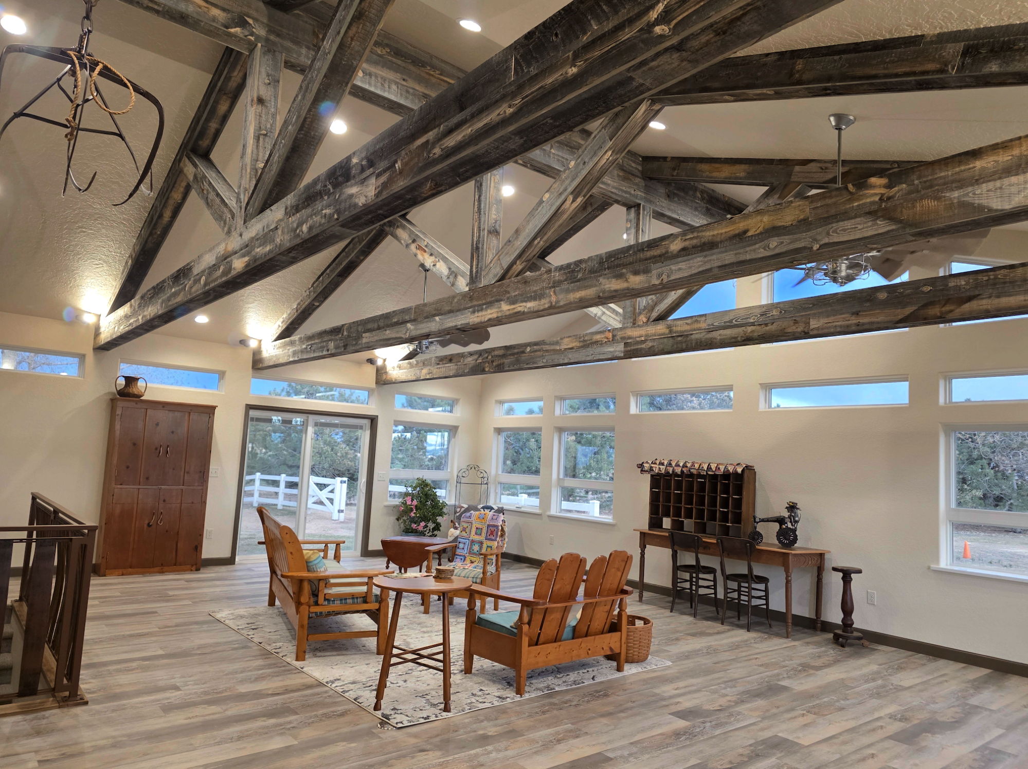 A living room with wooden ceiling beams