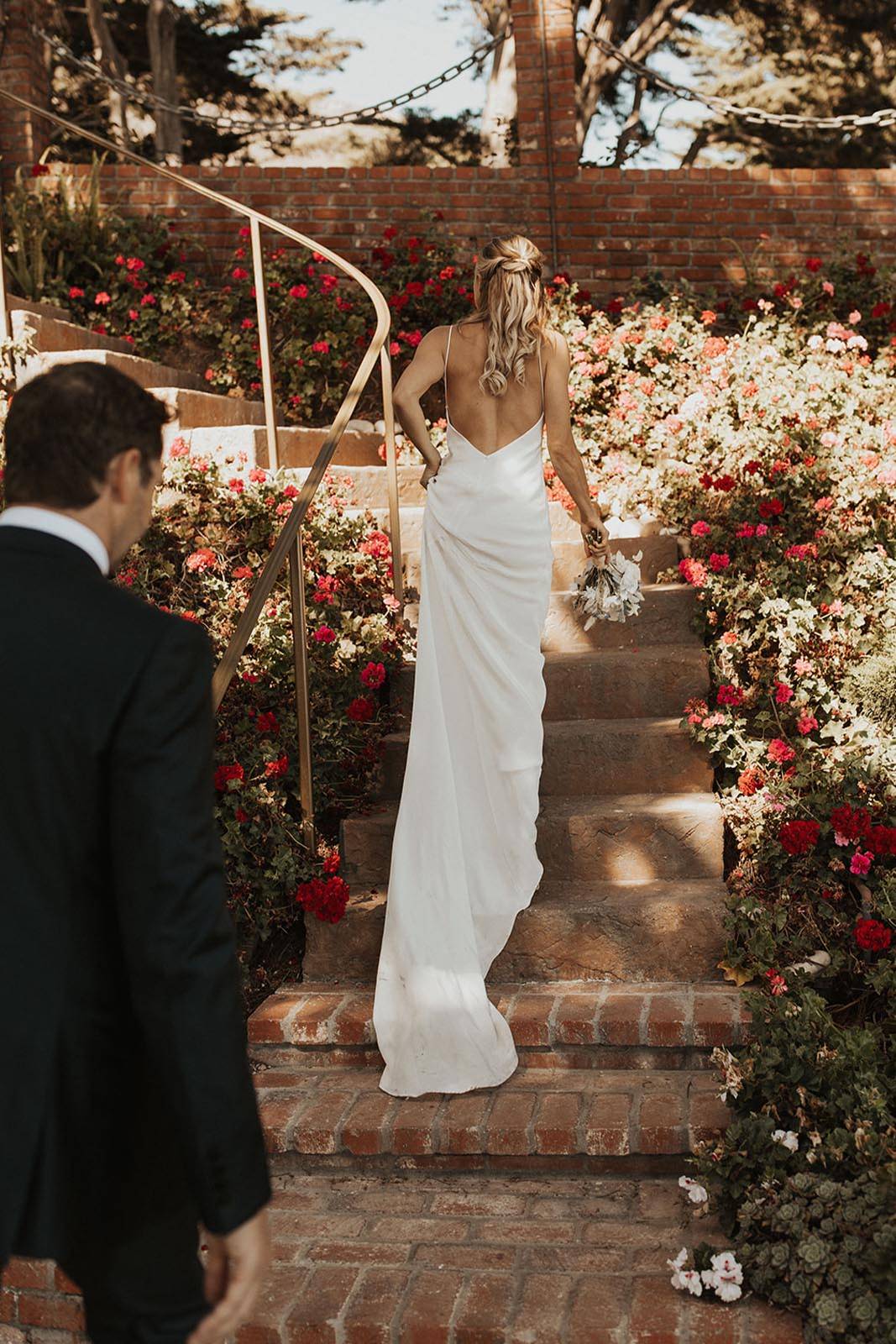 Bride walking upstairs