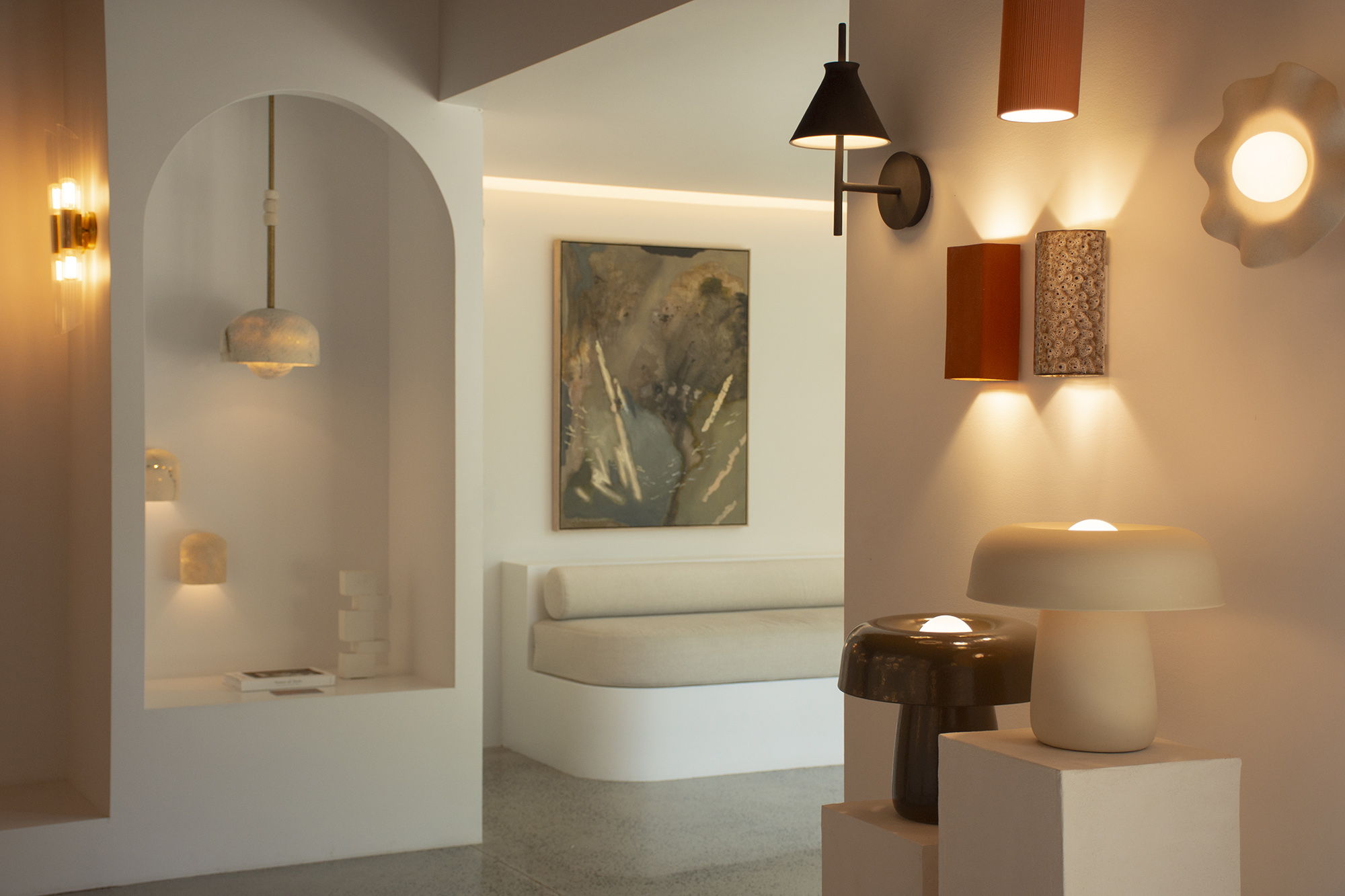 Modern interior with artistic lighting and minimalist decor elements.