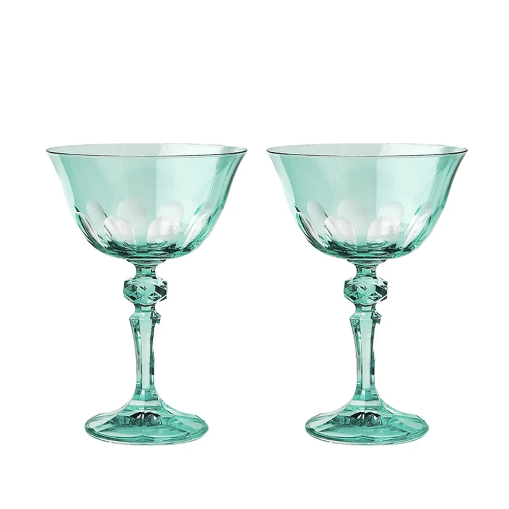Two elegant turquoise glass dessert cups on a white background.