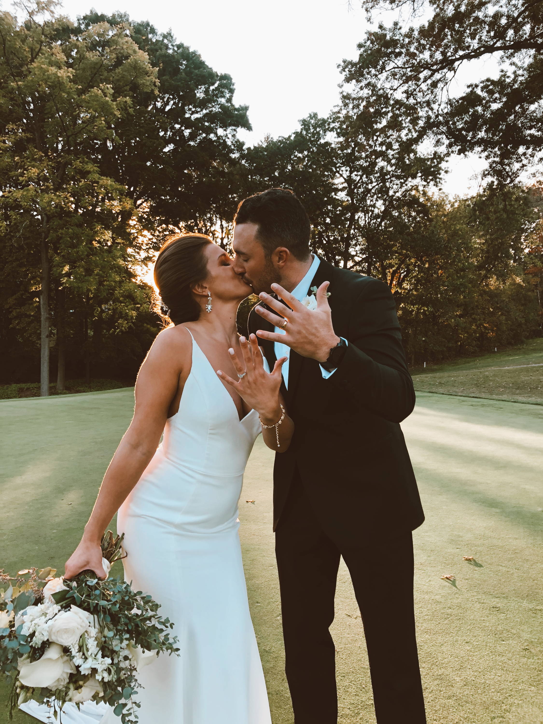 Alexander & Emily Share a Kiss on Their Wedding Day