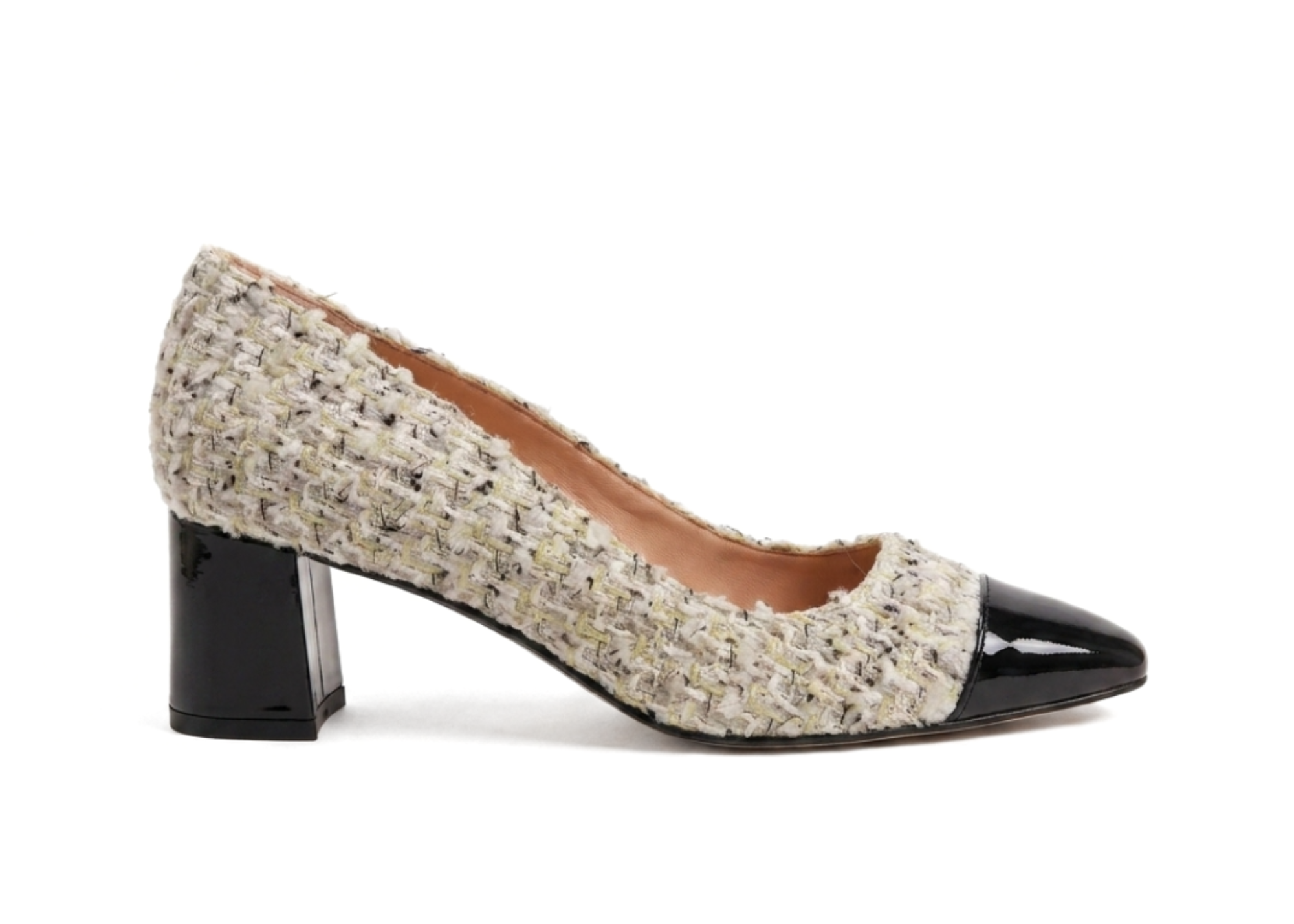 A stylish beige and black heeled shoe with a textured upper.