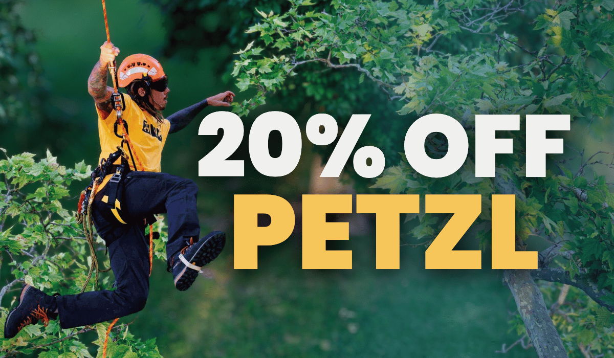 Person zip-lining with a promotional text for 20% off Petzl gear.
