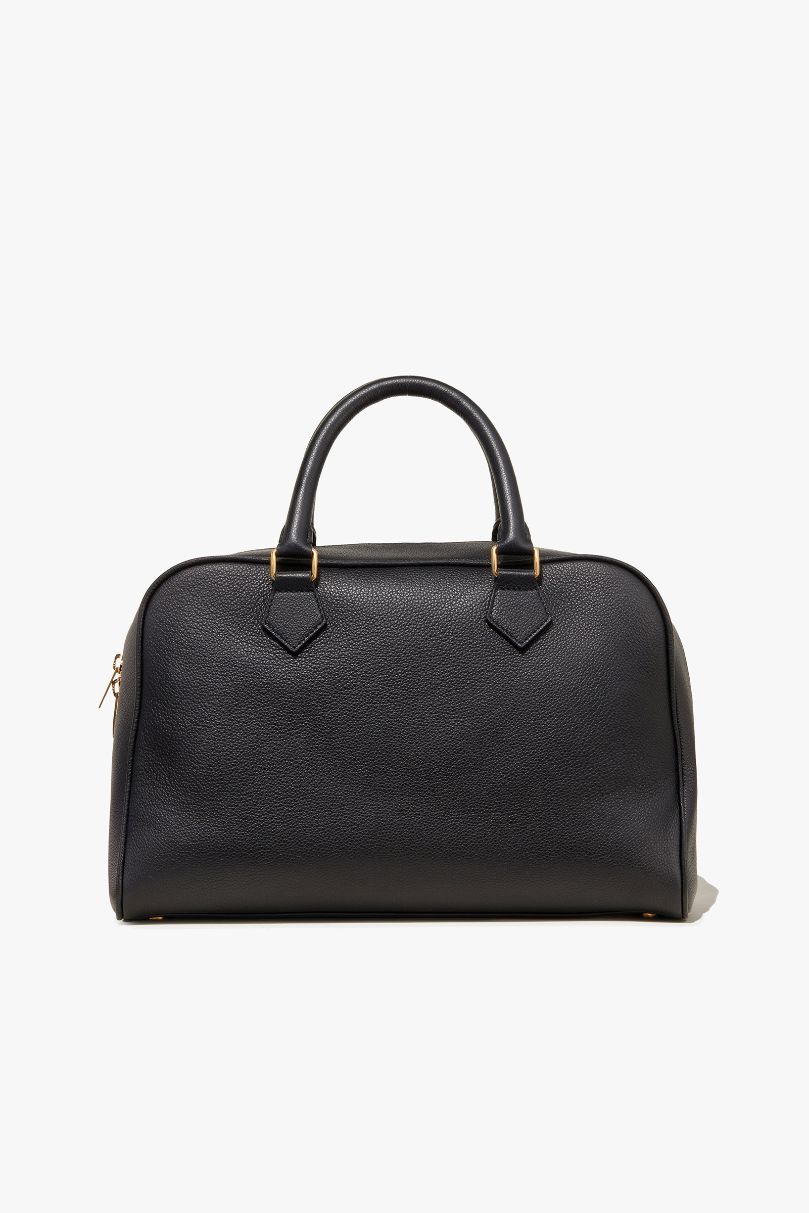 Black handbag with two handles and gold accents.