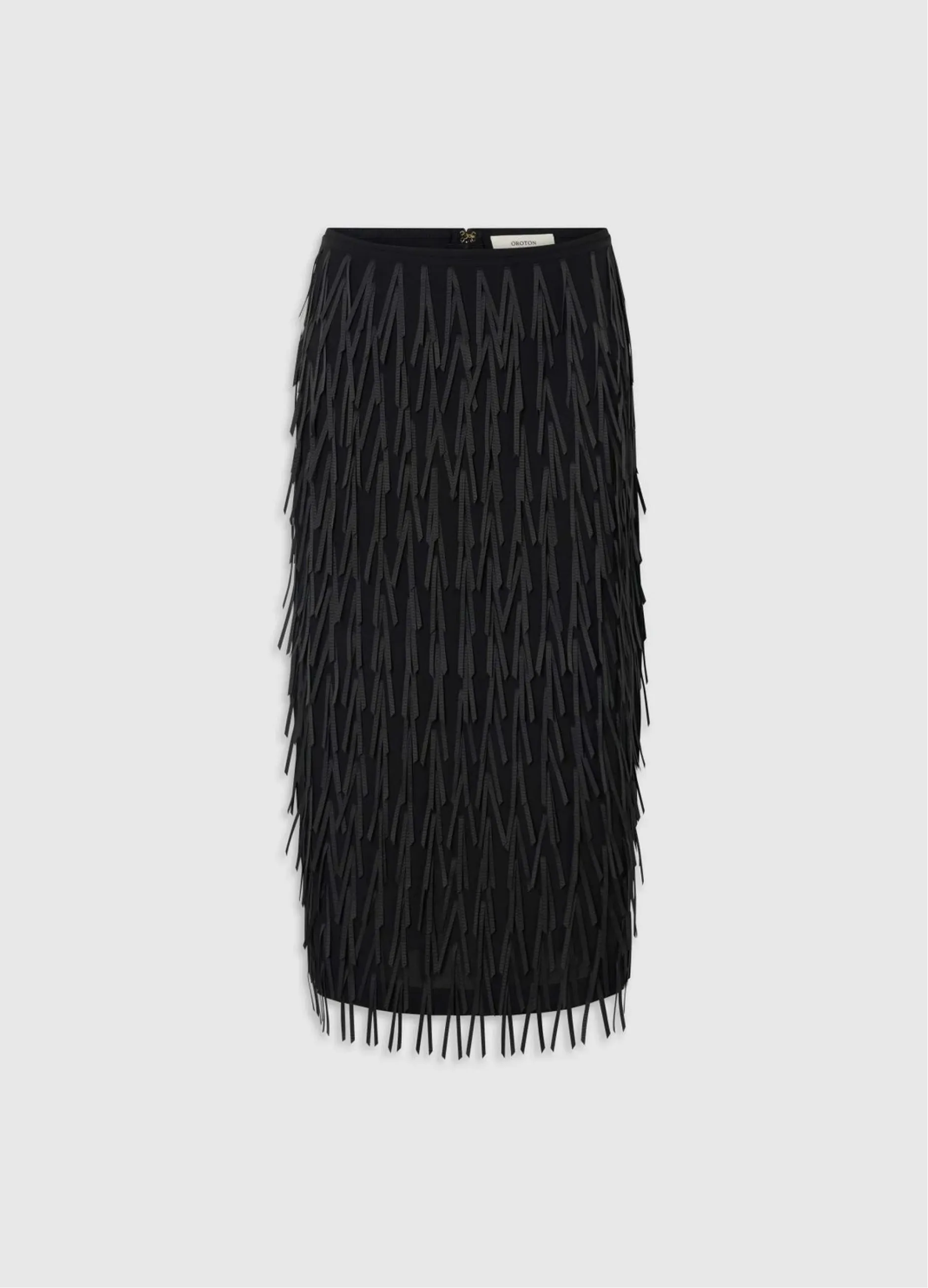 Black fringed pencil skirt on a plain background.