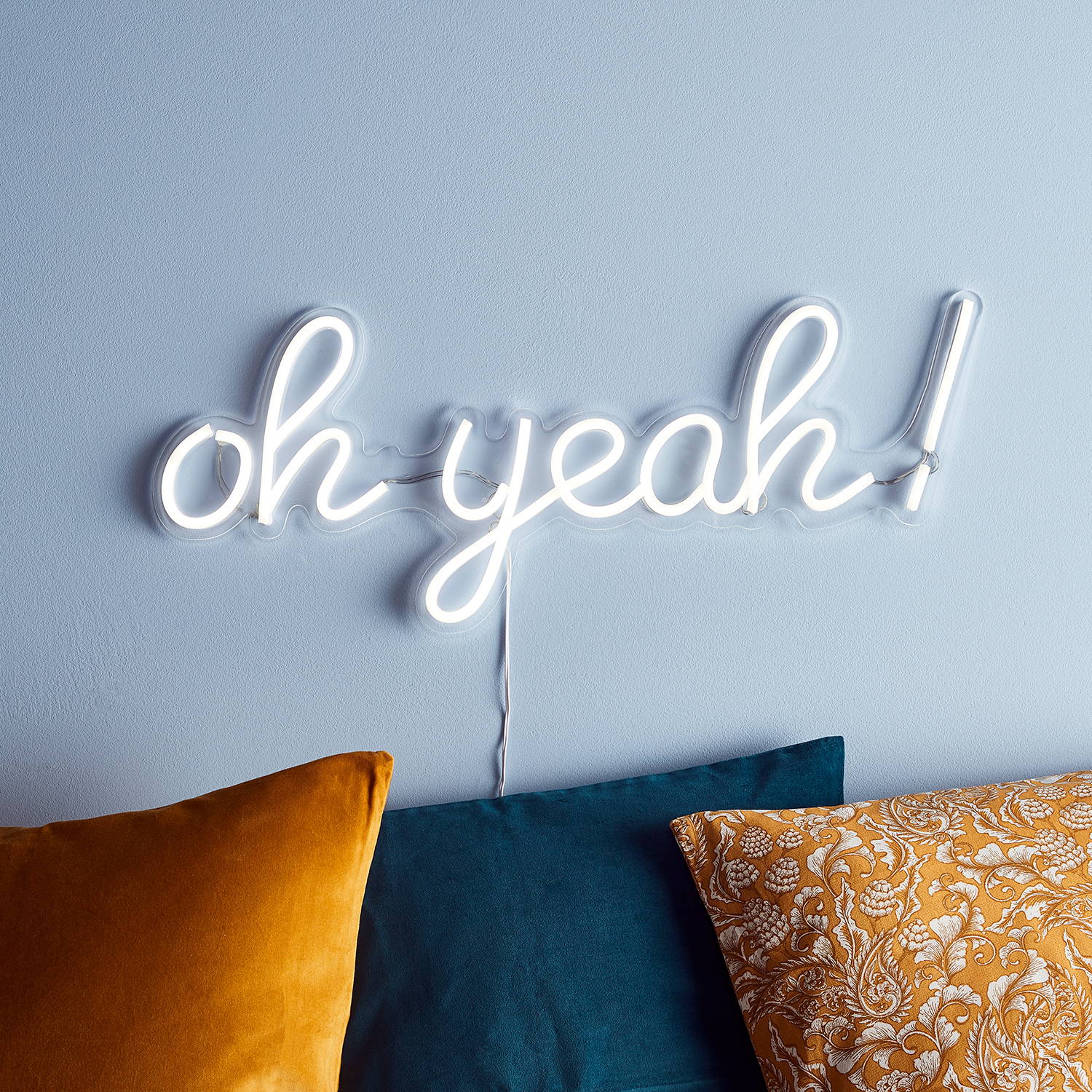 Oh yeah neon sign illuminated on wall
