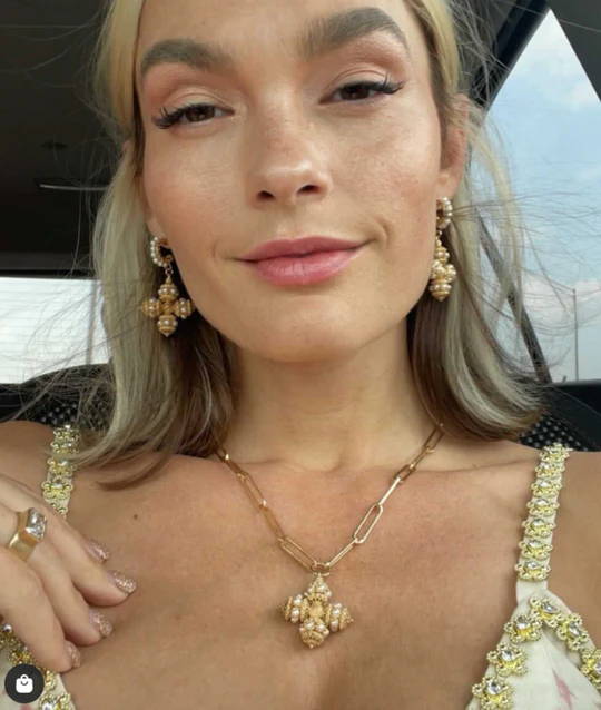 Quigley Goode wears Soru Jewellery  gold and mini pearl necklace and earrings 