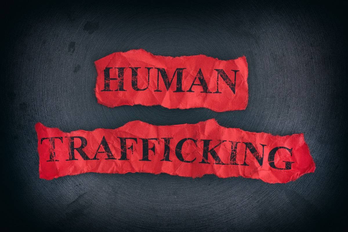 Human Trafficking on Red Paper