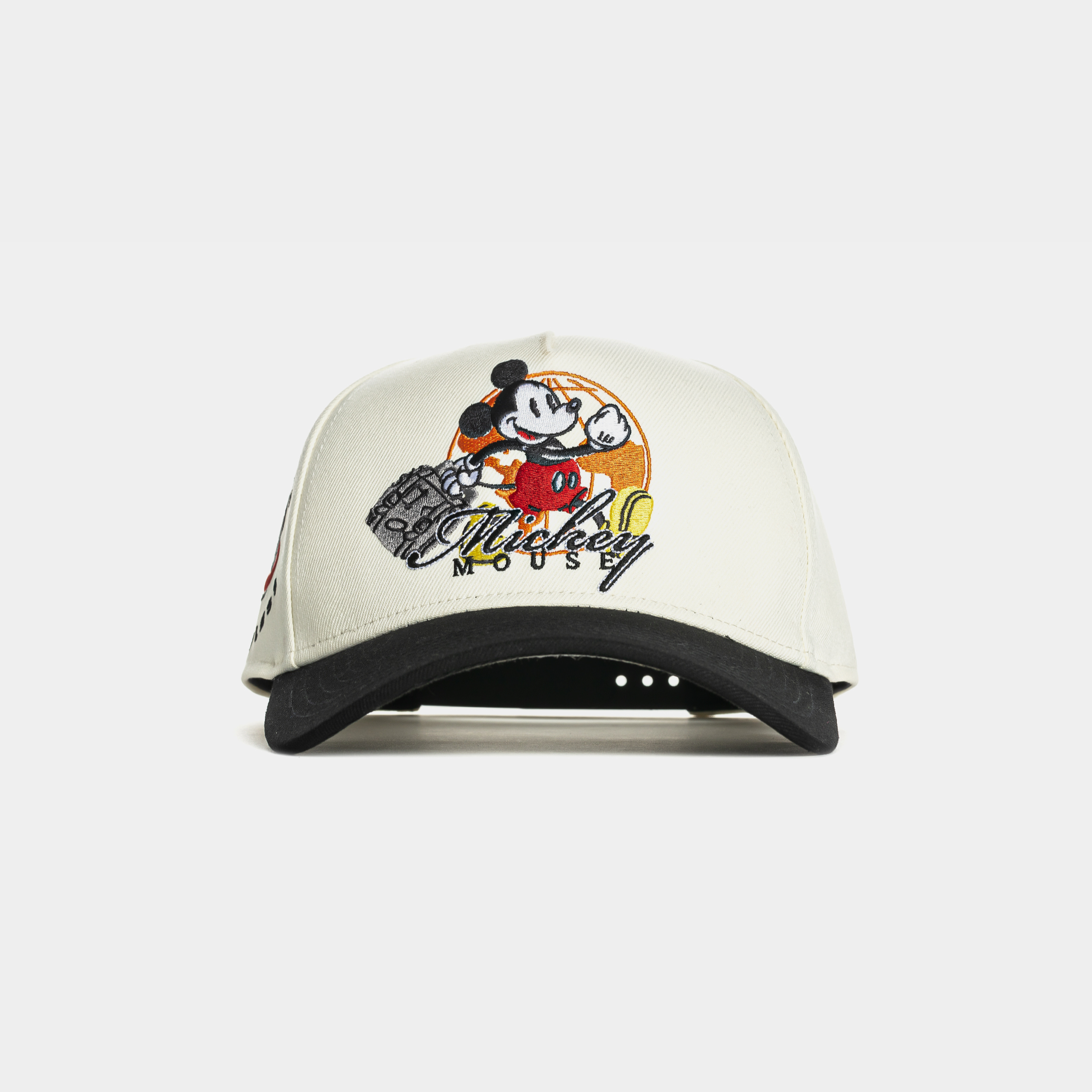 White cap featuring Mickey Mouse and 