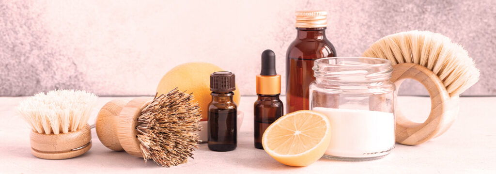 Various skincare products and tools arranged on a light background.