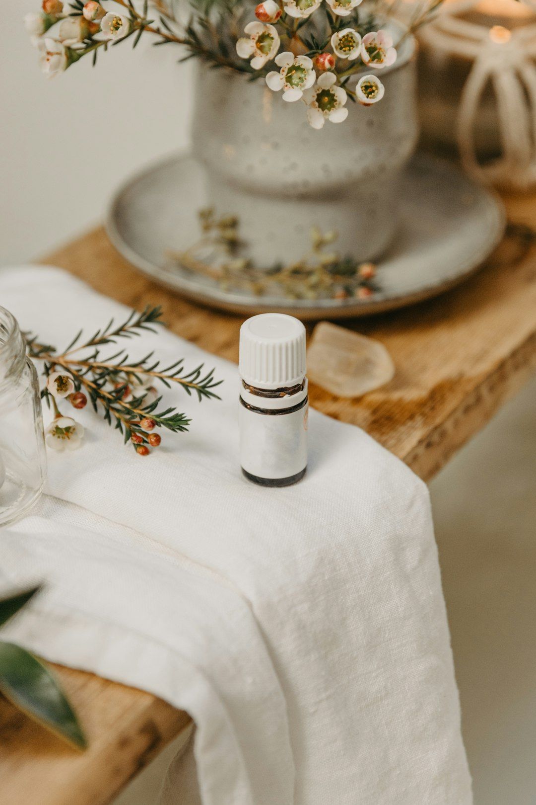 a white candle on a table