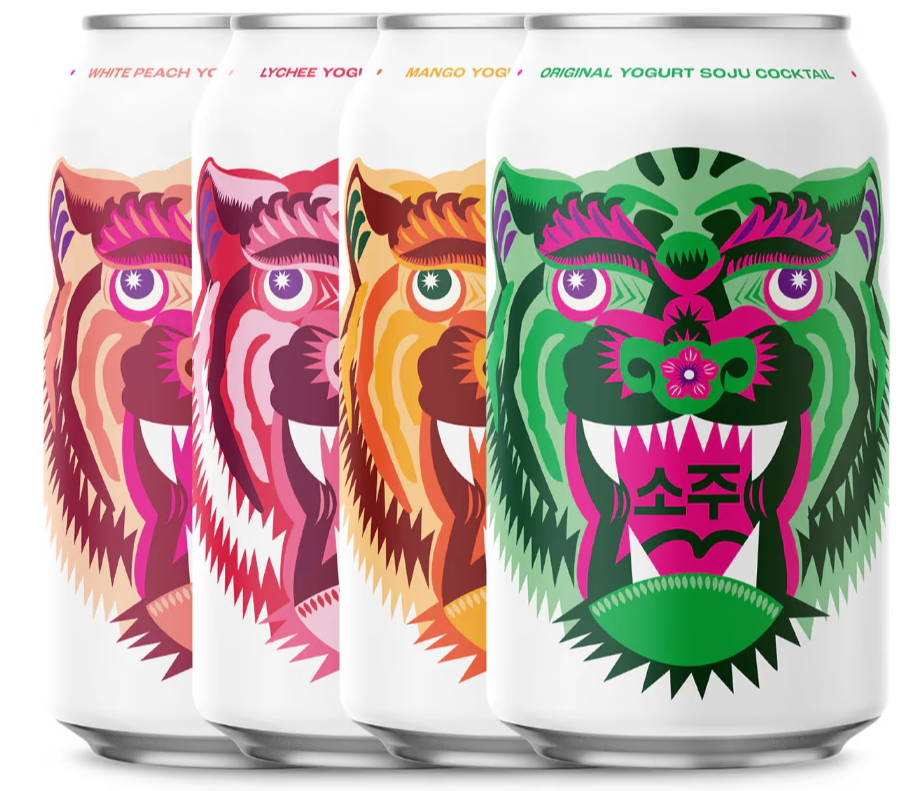 Four colorful beverage cans featuring stylized tiger designs.