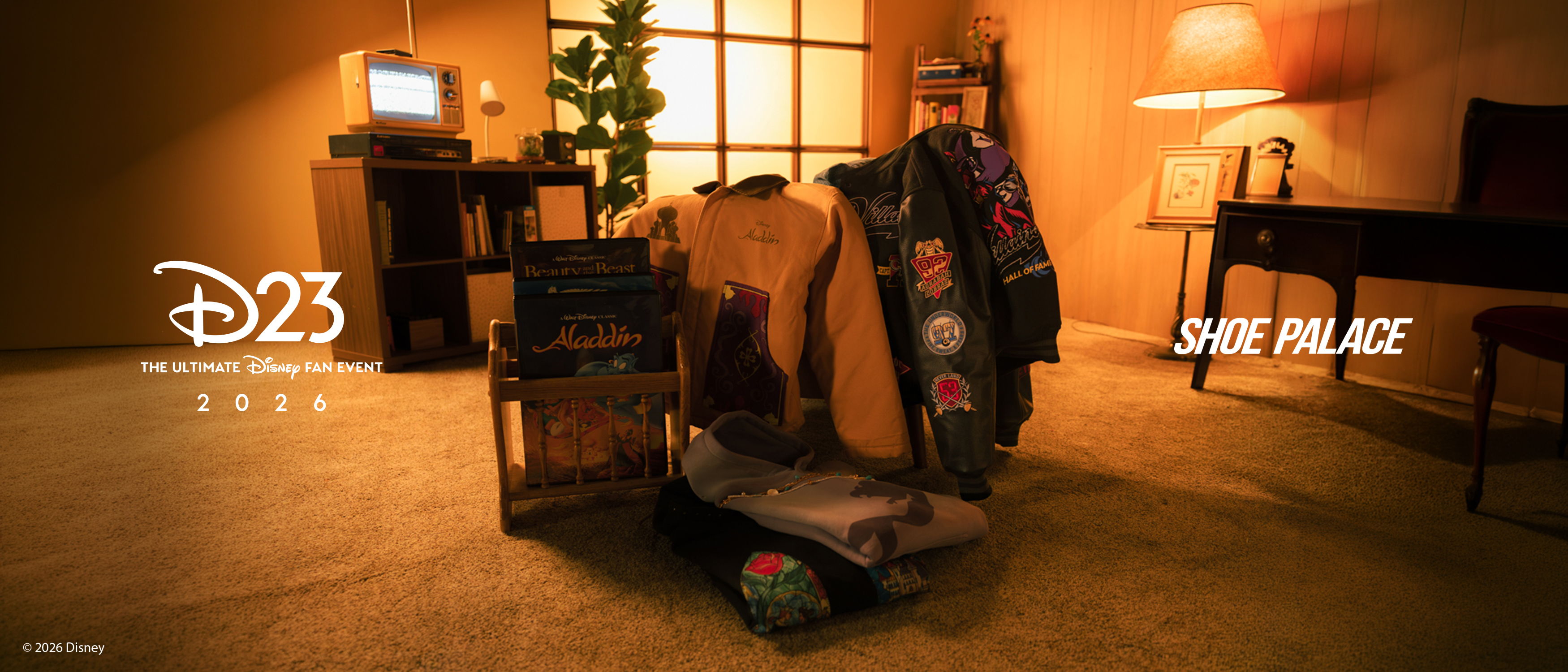 Luggage and a skateboard in a cozy room setting.