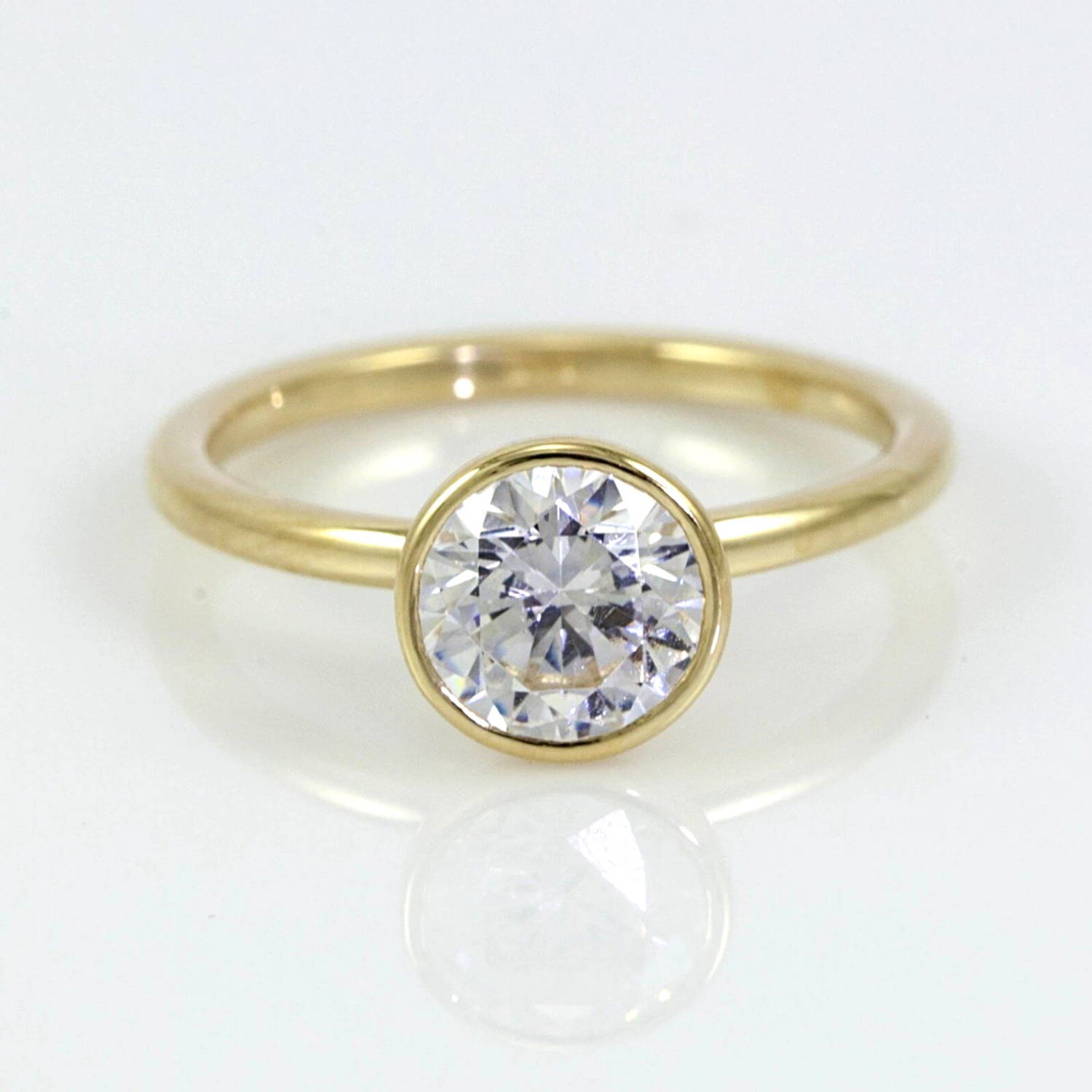 Mark Patterson bezel set solitaire diamond ring