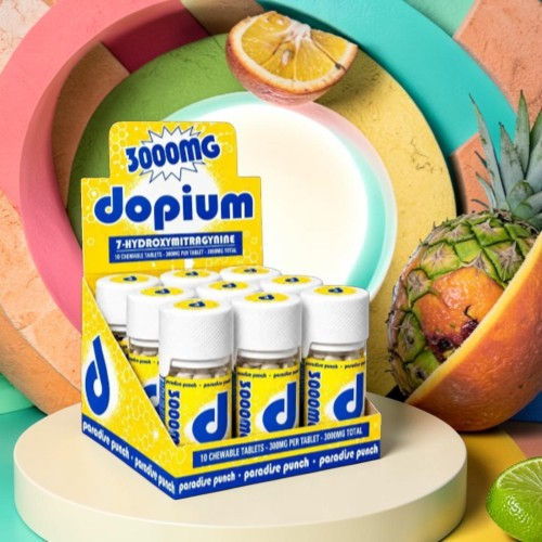 Box of Dopium bottles with colorful background and fruits.