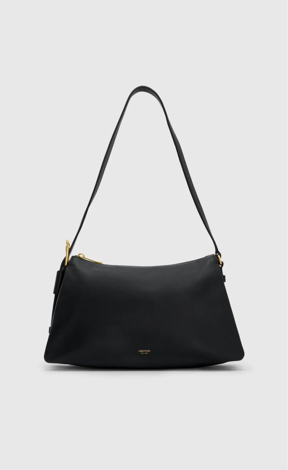 Black handbag with a shoulder strap and gold accents.