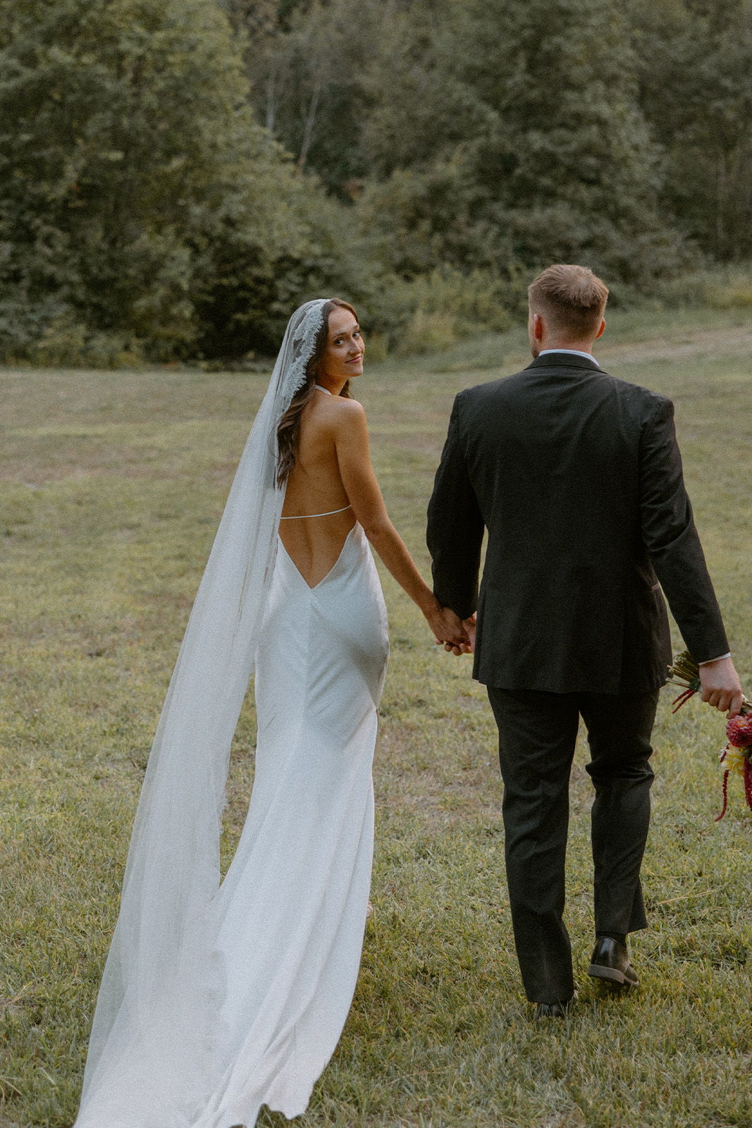 Bride and groom surrounded by nature