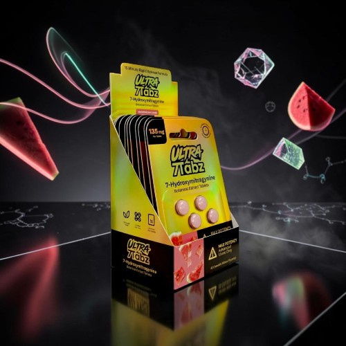 Colorful display box of candy with watermelon and ice graphics.