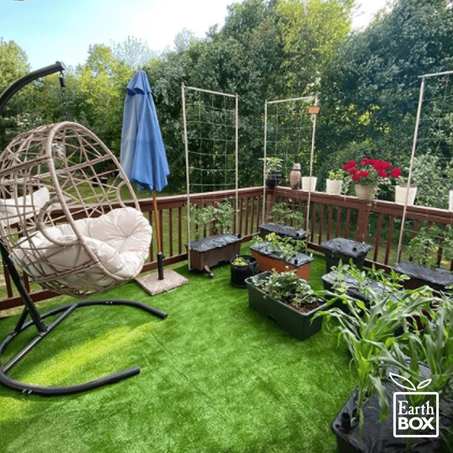 Outdoor garden space with swing and EarthBox gardening containers