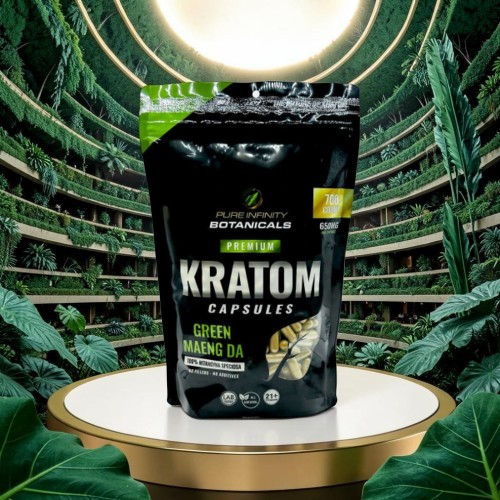 Kratom capsules packaging displayed in a lush, green environment.