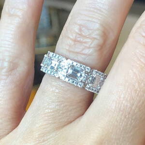 links ring with emerald cut diamonds