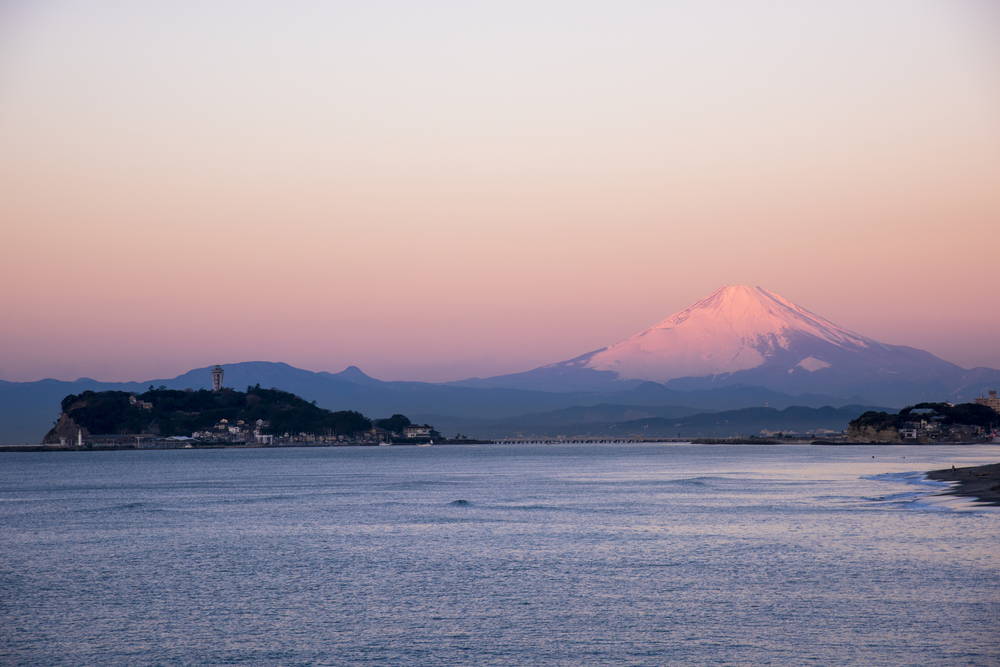 View of Enoshima, Japan at Dawn with Mt. Fuji in the distance
