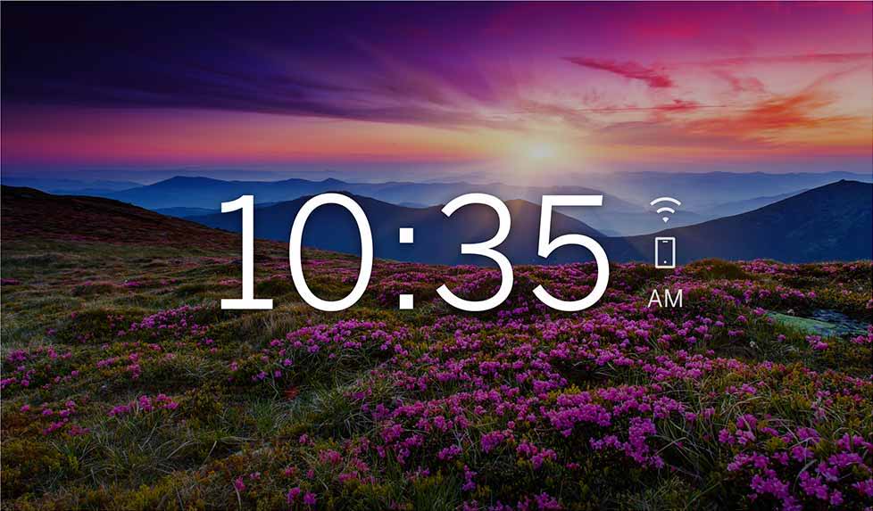 wall oven LCD display featuring beautiful flowers in a field at sunrise