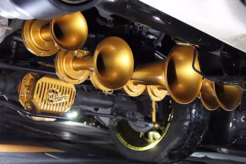 Air system installed under a spare tire delete bracket