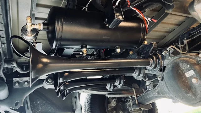 Matte black air tank five train horns pressure gauge brass fittings leaf springs rear axle undercarriage Stephen's 2020 Tundra 244 gallery photo 5