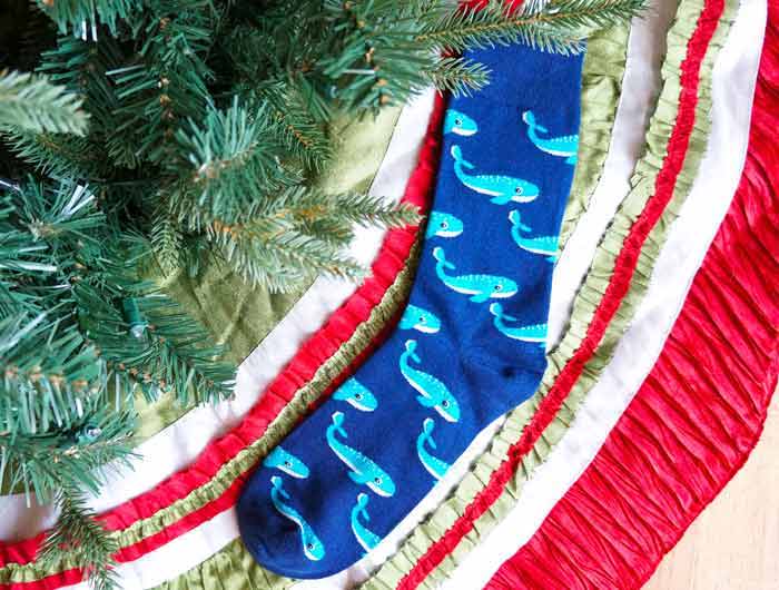 Novelty socks under a Christmas tree