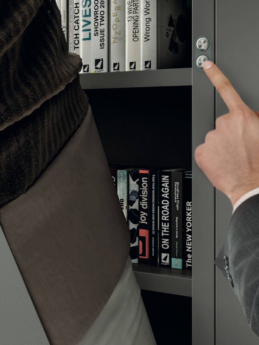 A person pointing opening a Clei bed