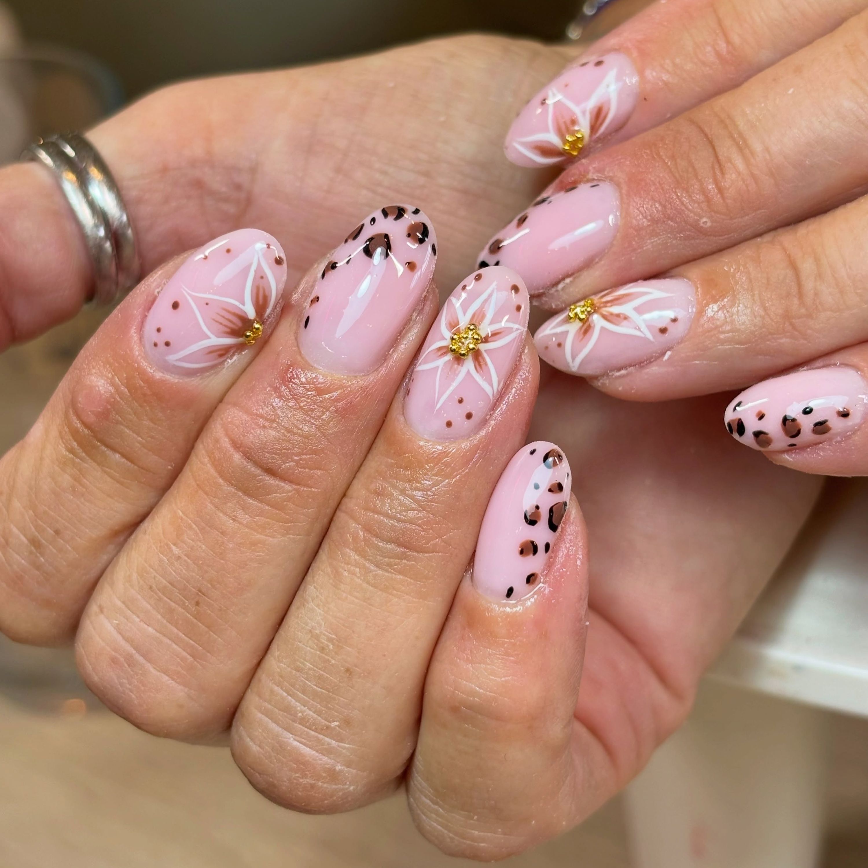 Floral and leopard print nails