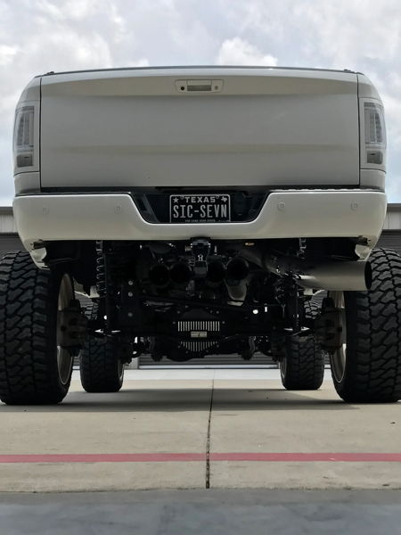 Rear undercarriage lifted white John's 2014 Dodge Ram 2500 chrome exhaust tip off-road tires Shocker XL Train HornBlasters featured customer install gallery photo 4