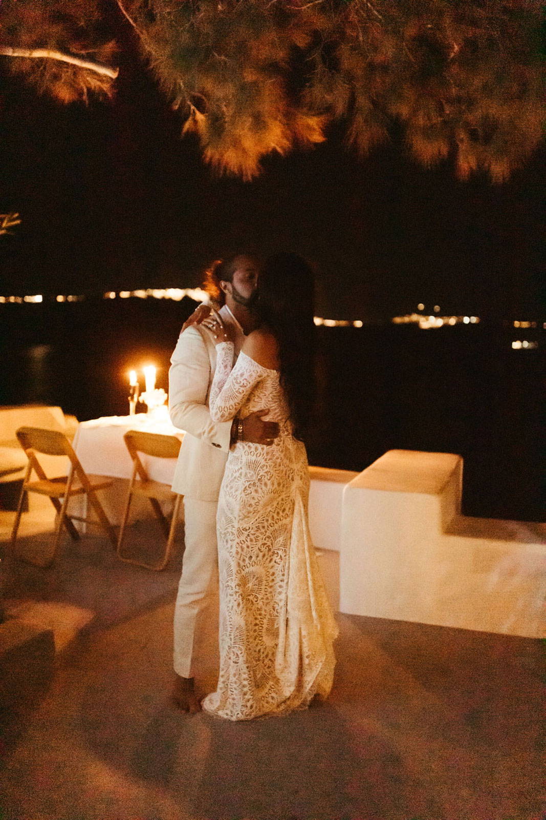 Bride and Groom kissing at their reception