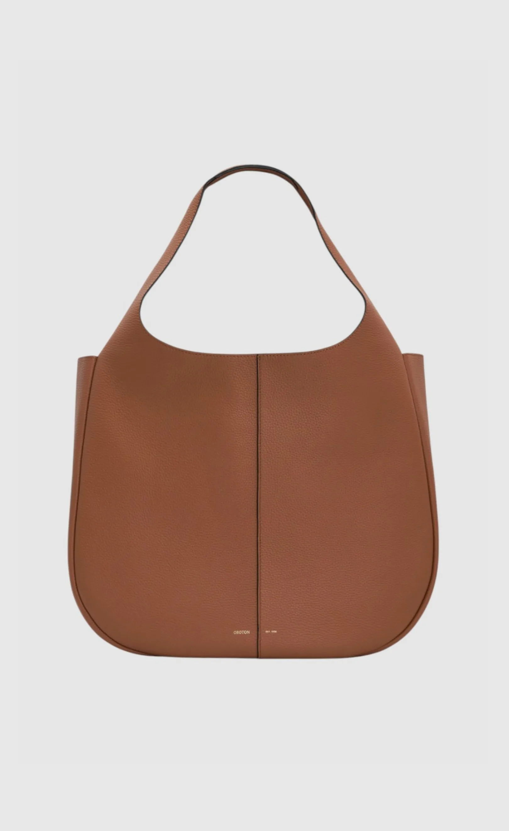 Brown leather tote bag with a minimalist design.